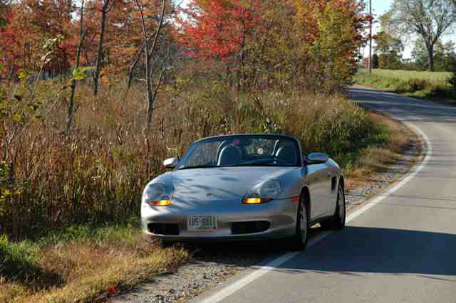 Berthold Langer
"This car is coming back to the dream for me. I bought my first Porsche at the tender age of 19 1/2 in 1979. It was an 8 year old, grass green, Porsche 911T. I got lots of laughs for that color, but loved it nevertheless, specially the carburetor sounds at traffic lights. :-) Then one day, on that lovely German Autobahn, I almost left this green earth trying to avoid a French 2CV (Duck) in the 3rd lane. Driving the Toy was never the same for me thereafter and so it had to go. :-( Exactly 25 years later I bought my second Toy. I decided it was time, the dream was lost for too long. Though it is not quite a 911, I enjoy driving the Toy with the top down immensely. And, did you notice? I still can't quite stay away from that green color, but this time it is a very special one. Don't you agree? :-)"- Berthold
