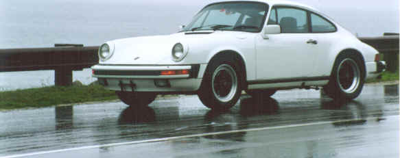 David Churcher
"For years I wanted a white Porsche and preferably from the 80s. Ellen Beck
found this one (she knew what I was looking for) ....it is a 1984 Carrera
and it has been well kept. Judy Hendrickson figures it is concours shape.

The license plate is HELMI which is my daughter's name .... she is
beautiful too." - David.
