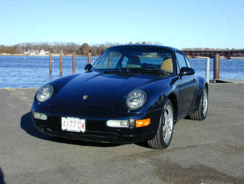 John Geisel & Betsy McNamara
John Geisel and Betsy McNamara's 1995 993 coupe
"We are the second owners, car was born in Germany, and raised in or around Tampa, Fla.
We bought the car in late July 2001, with 23,000 actual miles. The car is a Carrera 2, six speed, 3.6 liter engine, six CD stereo music system. We love the car - it turns a few heads." - John


