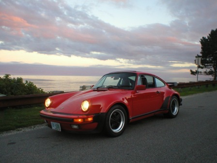 Kyle Tucker
1986 930 - Guards red on black leather, 27,400 original miles.
All stock except 930S steering wheel, limited slip & sunroof.
"It's my first Porsche and I see no reason it shouldn't be my
last as I can't imagine anything nicer - well maybe an 89. :-)" - Kyle
