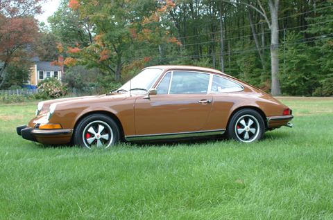 Larry & Donna Smith
"1973 911T purchased in Aug. of 2002 with 58,000 miles.
Upgraded after purchase with Stainless Steel heat exchangers,
Carrera chain tensioners and Pertronix Igniter to eliminate the distributor points.
Really a fun car to drive, it now has 70,000 miles on it."
 - Larry Smith
